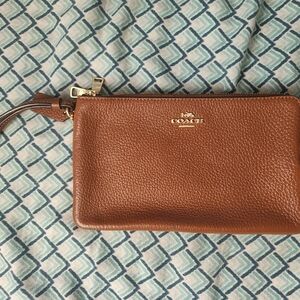 Brand new Coach wristlet